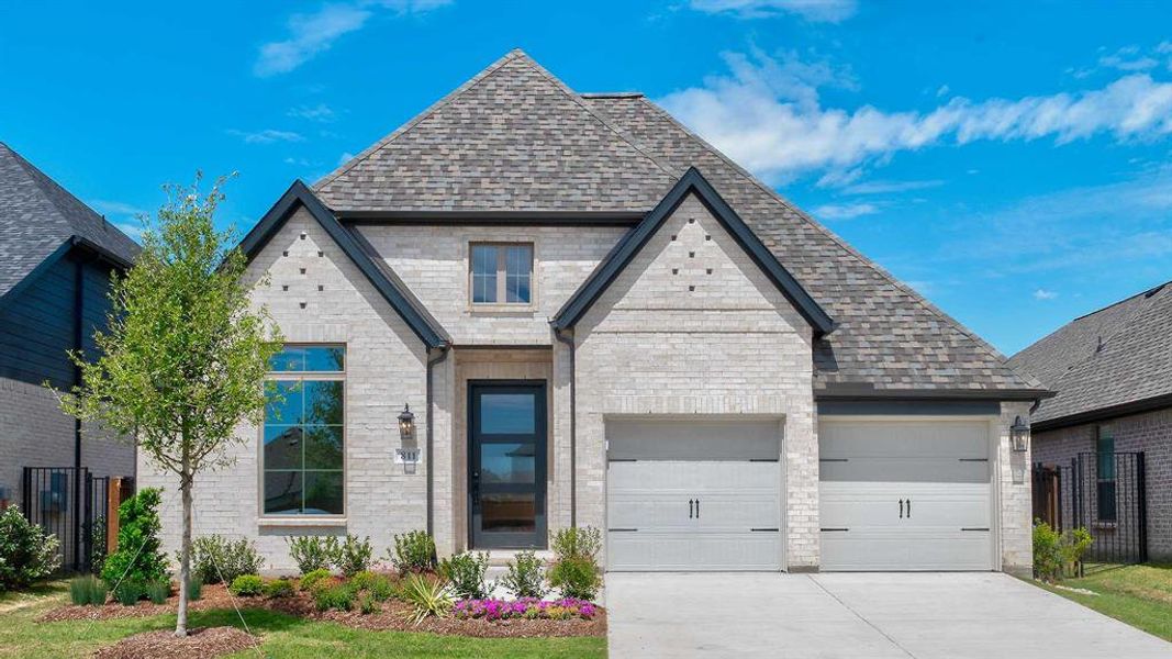 Front exterior of a new home in Hillstead, Lavon, TX, highlighting curb appeal (Image 1). Front exterior of a new home in Hillstead, Lavon, TX, highlighting curb appeal (Image 1).