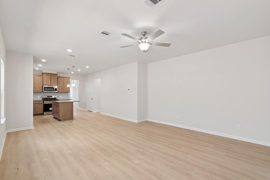 The Mockingbird II- Family Room into the Kitchen The Mockingbird II- Family Room into the Kitchen