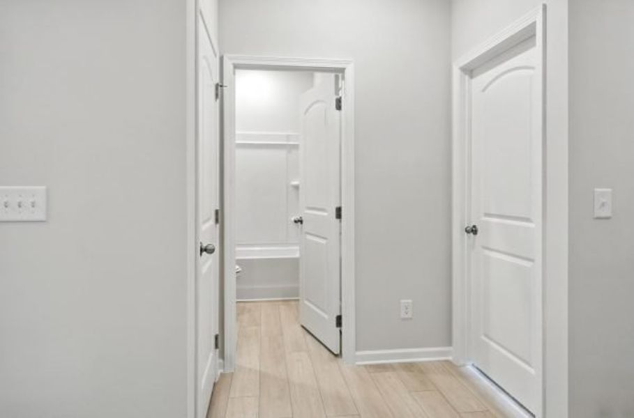 Representative unfurnished interior of a home built from the Orchard by Piedmont Residential in Villages at Cedar Hill, Dallas (Image 26).