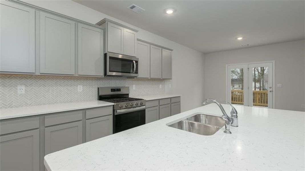 Furnished interior view inside a new home in Brooks Station, Dacula (Image 4).