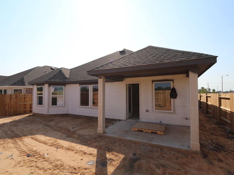 Front exterior of a new home in Lago Mar, Santa Fe, TX, highlighting curb appeal (Image 2). Front exterior of a new home in Lago Mar, Santa Fe, TX, highlighting curb appeal (Image 2).