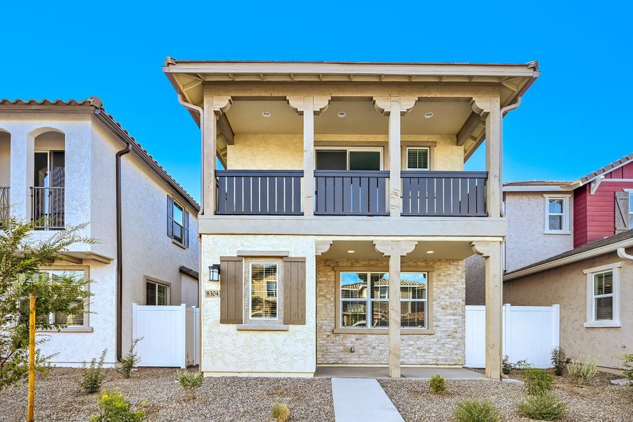 Exterior details and patio area of a home in Hawes Crossing, Mesa (Image 2).