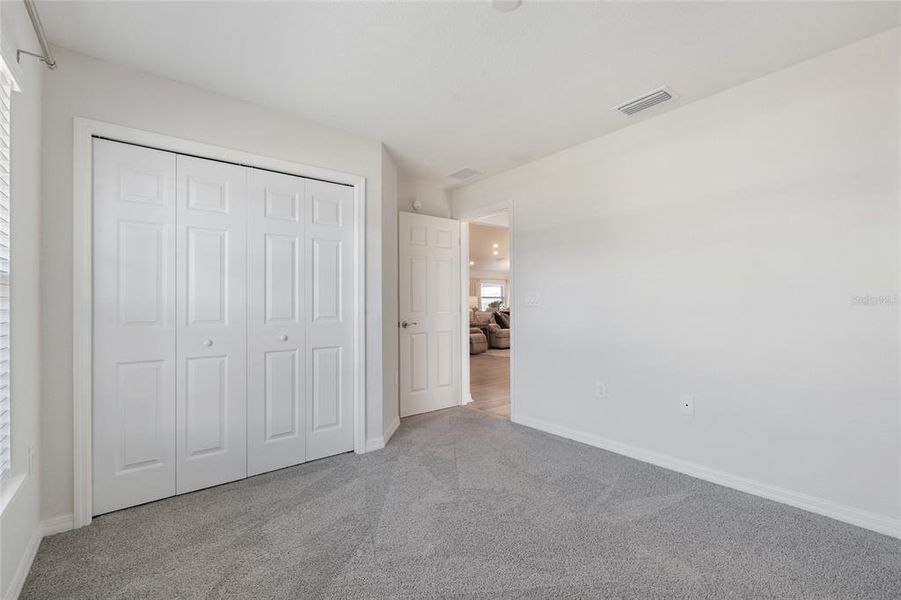 Spacious, unfurnished interior of a new home in Aviary at Rutland Ranch, Parrish (Image 23).