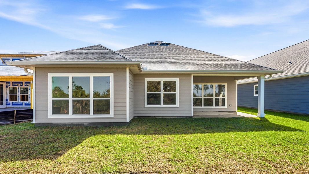 Exterior details and patio area of a home in WindMark Beach, Port Saint Joe (Image 4).