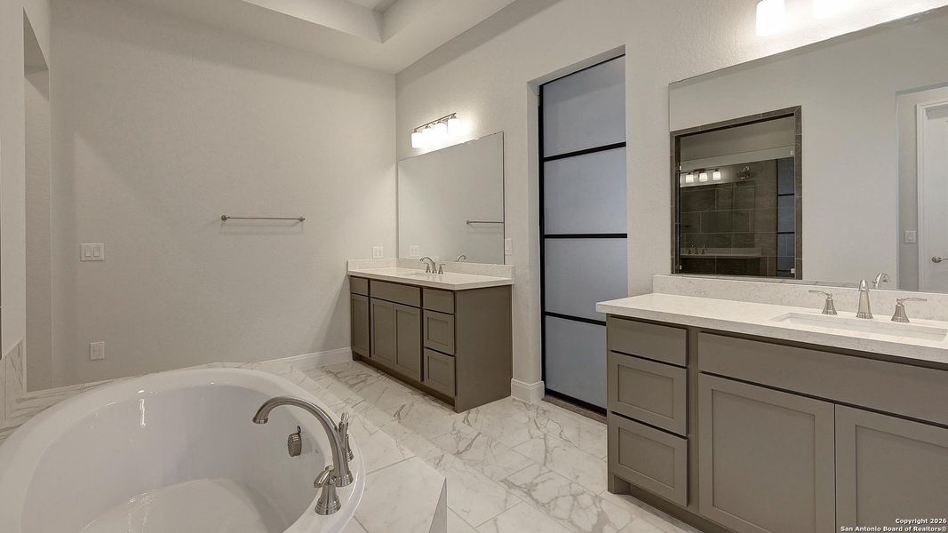 Furnished interior view inside a new home in Vida 50', San Antonio (Image 10).