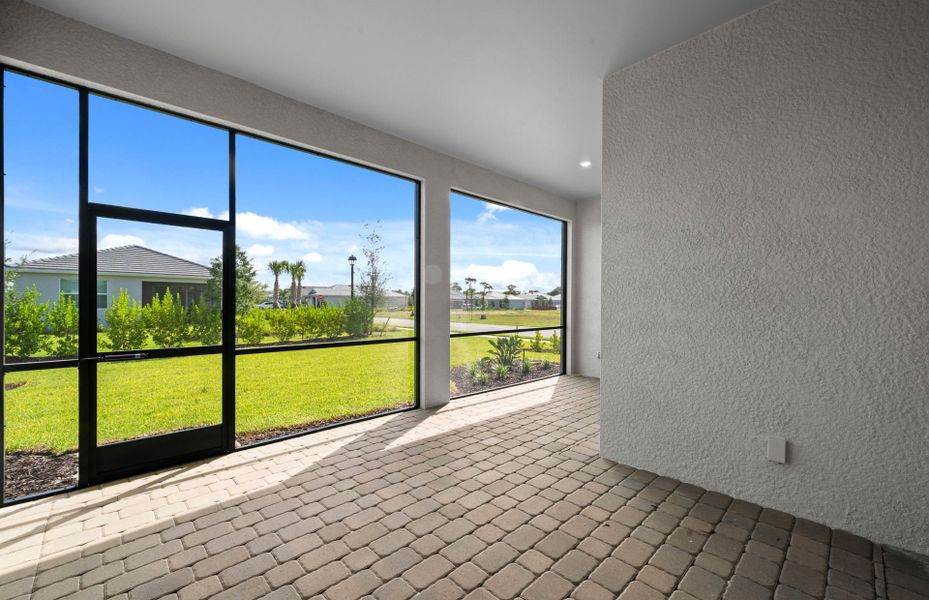 Exterior details and patio area of a home in Del Webb Oak Creek, North Fort Myers (Image 26).