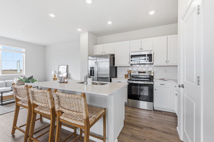 Furnished interior view inside a new home in Windler, Aurora (Image 7).