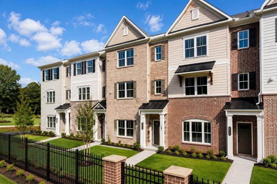 Front exterior of a new home in Wilkins Walk, Mableton, GA, highlighting curb appeal (Image 23). Front exterior of a new home in Wilkins Walk, Mableton, GA, highlighting curb appeal (Image 23).