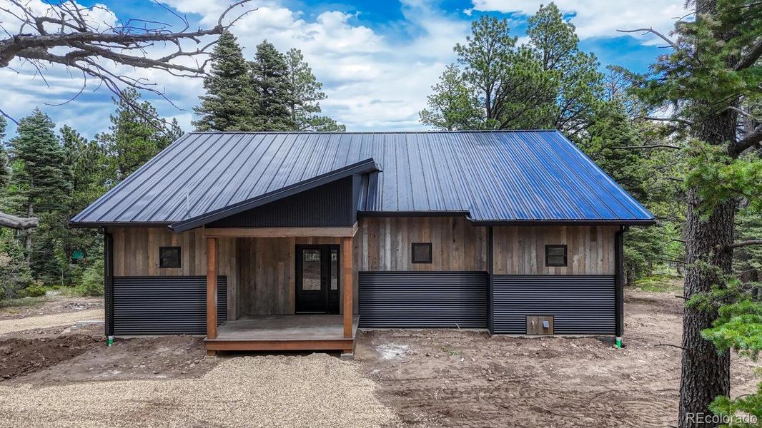 Front exterior of a new home in , Westcliffe, CO, highlighting curb appeal (Image 20).