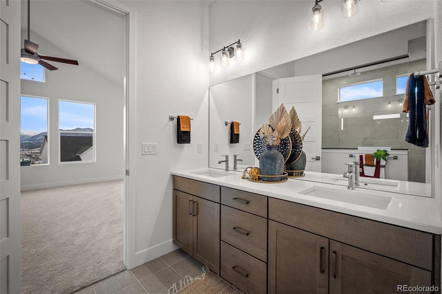 Furnished interior view inside a new home in Cloverleaf - Pinnacle Collection, Monument (Image 9).