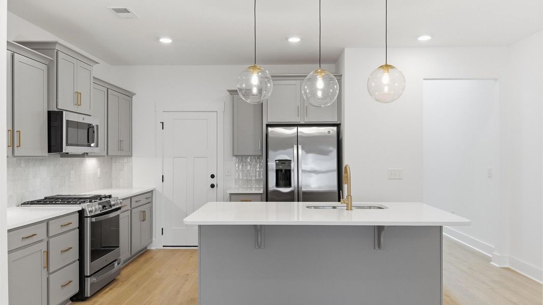 Furnished interior view inside a new home in Village at Midway, Anderson (Image 11).
