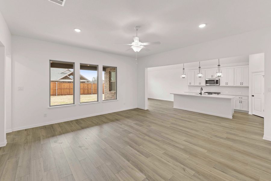 Open Kitchen-Living-Dining Room Representative Photo featuring the Harmony Collection