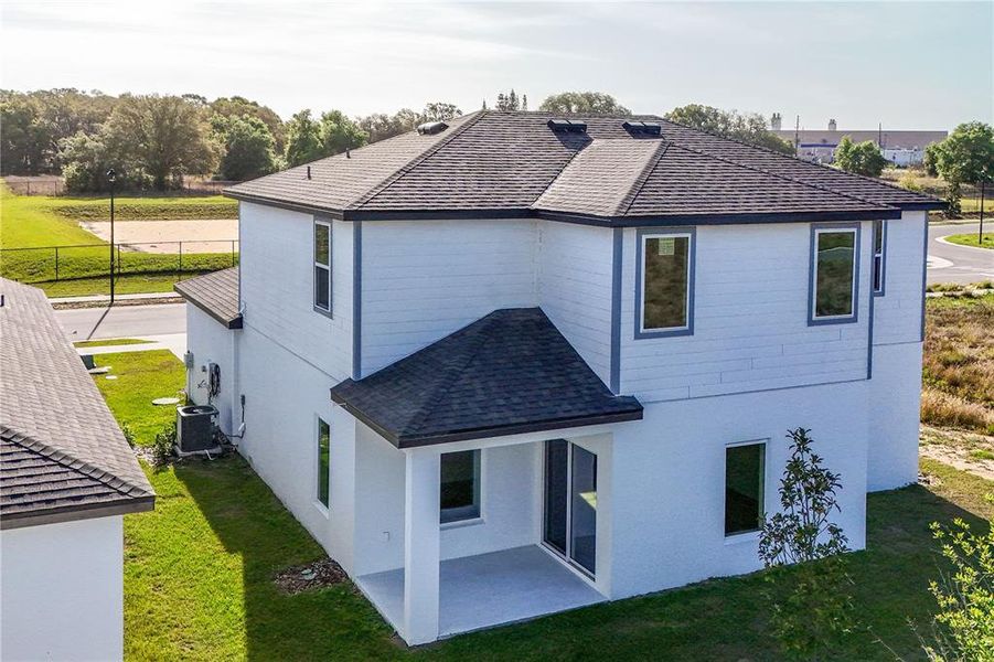 Exterior details and patio area of a home in Tula Parc, Astatula (Image 4).