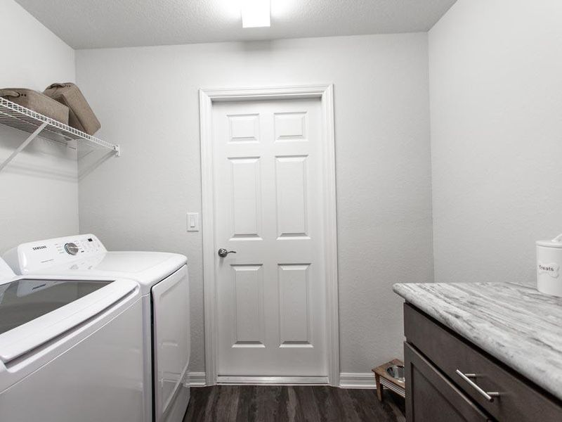 This home is move-in ready with Samsung laundry machines, window blinds, ceiling fans, a security system, and much more!