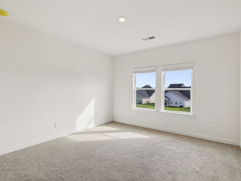 The primary suite offers a private retreat.