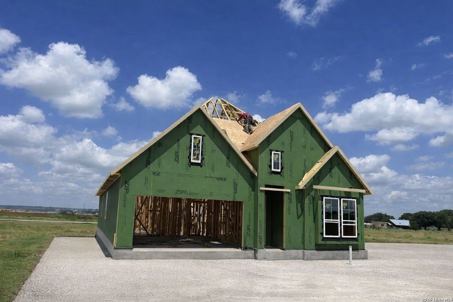 In-progress construction of a new home in Megan's Landing, Castroville, TX (Image 4).