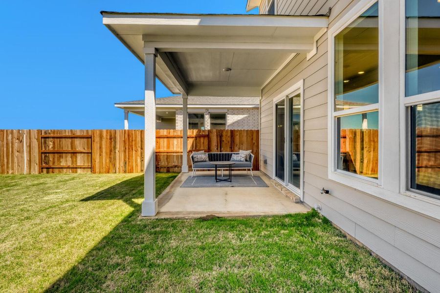 Exterior details and patio area of a home in Freedom at Anthem, Kyle (Image 4).