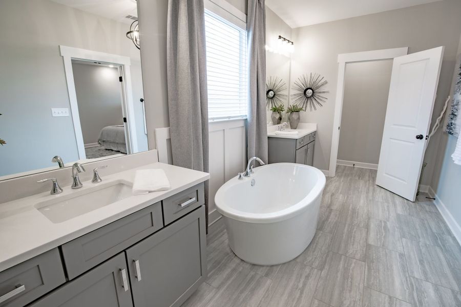 Representative furnished interior of a home built from the Willow by Grant & Co in Manor at Hall Creek, Arlington (Image 56).