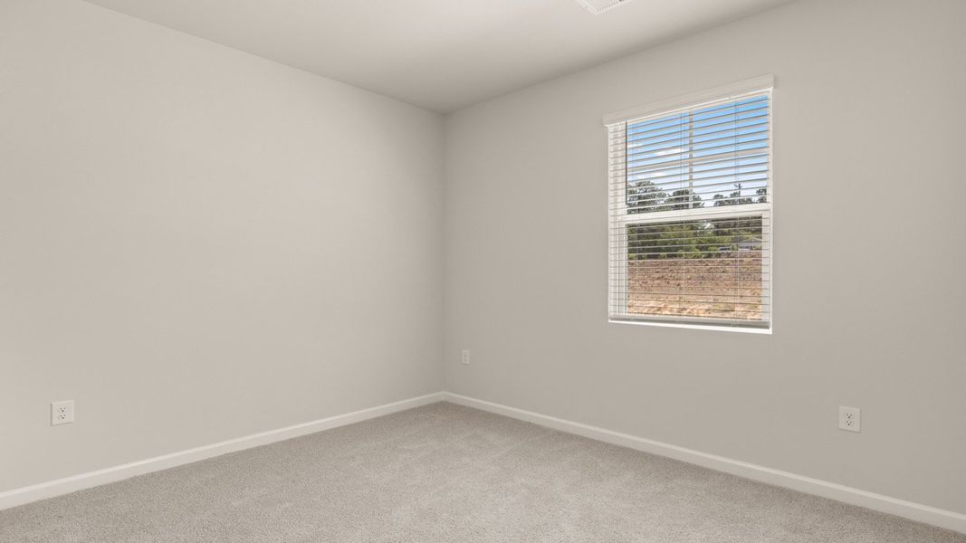 Spacious, unfurnished interior of a new home in Byrd Village, Graniteville (Image 19).