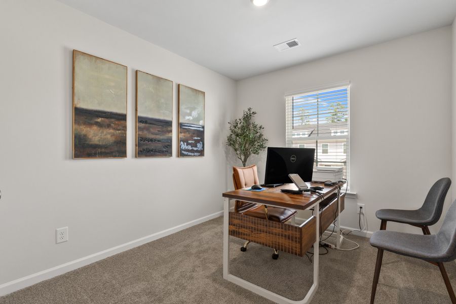 Representative furnished interior of a home built from the Palmetto II by McGuinn Homes in Clarke Townes, Anderson (Image 45).
