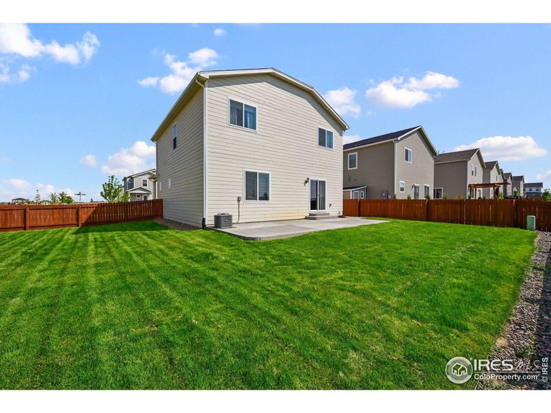 Front exterior of a new home in Hidden Creek, Frederick, CO, highlighting curb appeal (Image 24).