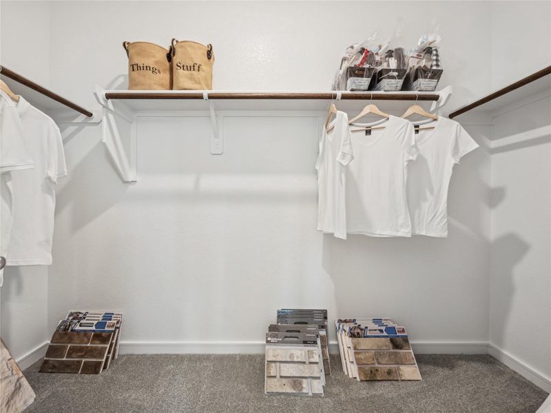 Primary walk-in closet (*Photo not of actual home and used for illustration purposes only.) Primary walk-in closet (*Photo not of actual home and used for illustration purposes only.)