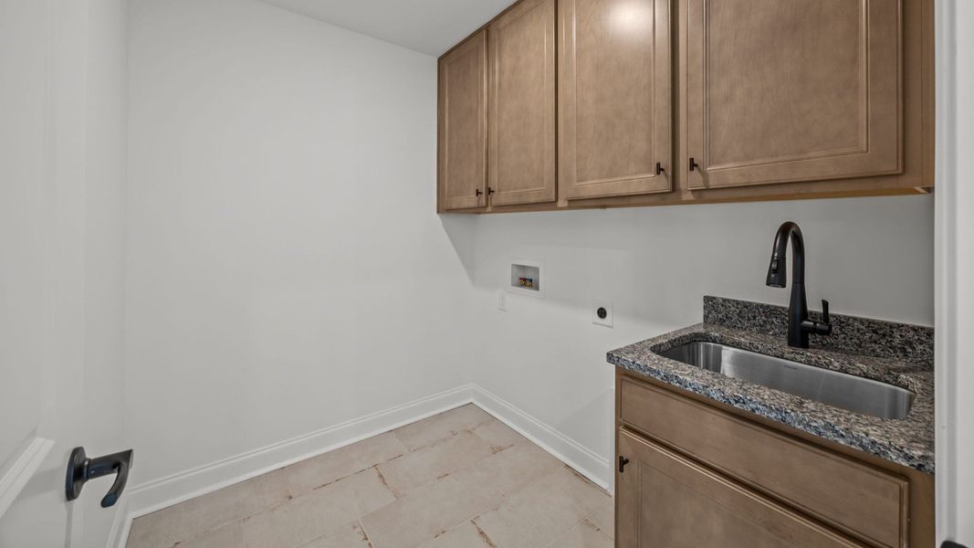 The Drayton Plan by DRB Homes in Farms at Bellingham, Mooresville NC - Laundry
