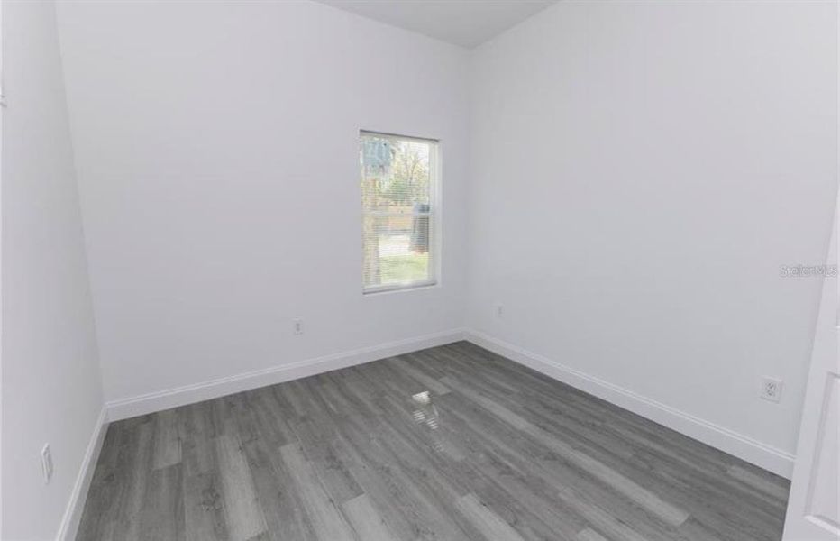 Spacious, unfurnished interior of a new home in , Lake Panasoffkee (Image 9).