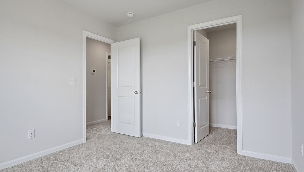 Spacious, unfurnished interior of a new home in Townes at Tap Root Farms, Fletcher (Image 15). Spacious, unfurnished interior of a new home in Townes at Tap Root Farms, Fletcher (Image 15).