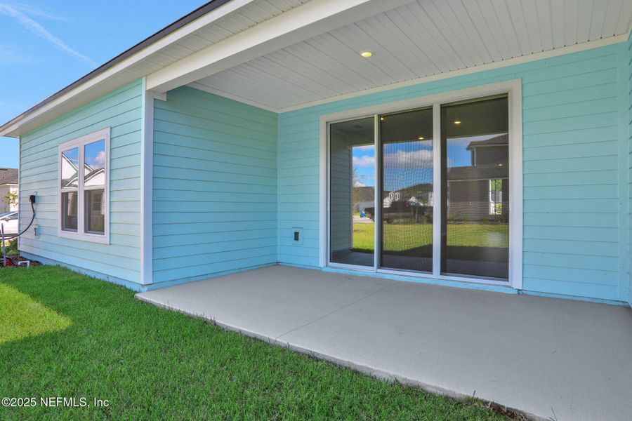 Exterior details and patio area of a home in Silver Landing at SilverLeaf, St. Augustine (Image 21).