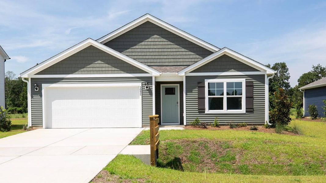 Front exterior of a new home in Halls Landing, Bolivia, NC, highlighting curb appeal (Image 1). Front exterior of a new home in Halls Landing, Bolivia, NC, highlighting curb appeal (Image 1).
