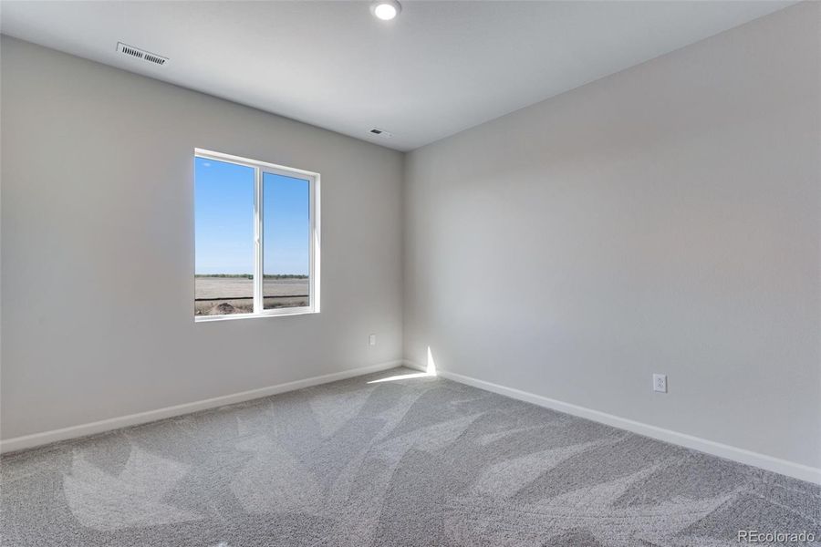 Spacious, unfurnished interior of a new home in Reunion Ridge, Commerce City (Image 17).
