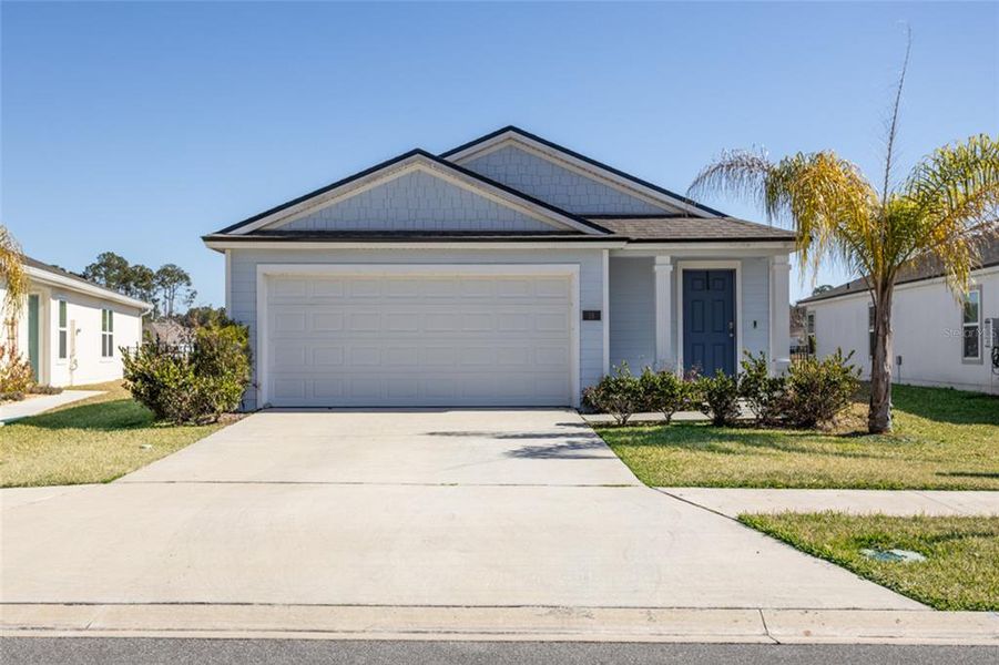 Front exterior of a new home in , Bunnell, FL, highlighting curb appeal (Image 1). Front exterior of a new home in , Bunnell, FL, highlighting curb appeal (Image 1).