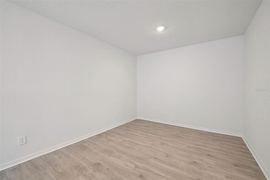 Spacious, unfurnished interior of a new home in Ridgehaven - Villas, Ormond Beach (Image 25).