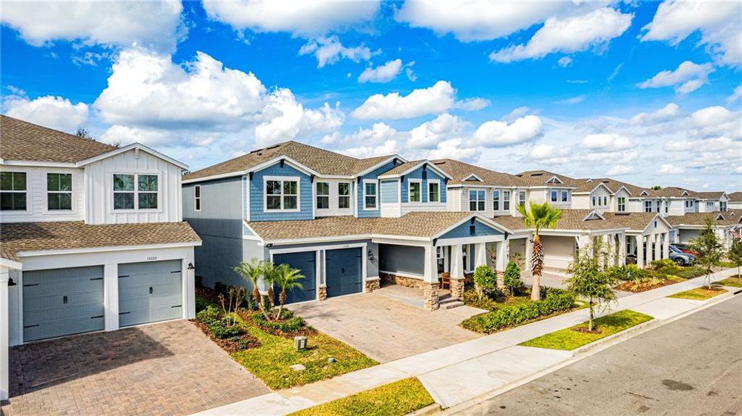 Front exterior of a new home in , Winter Garden, FL, highlighting curb appeal (Image 28). Front exterior of a new home in , Winter Garden, FL, highlighting curb appeal (Image 28).