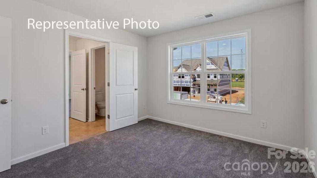 Spacious, unfurnished interior of a new home in Sanctuary at Southgate, Indian Trail (Image 16).