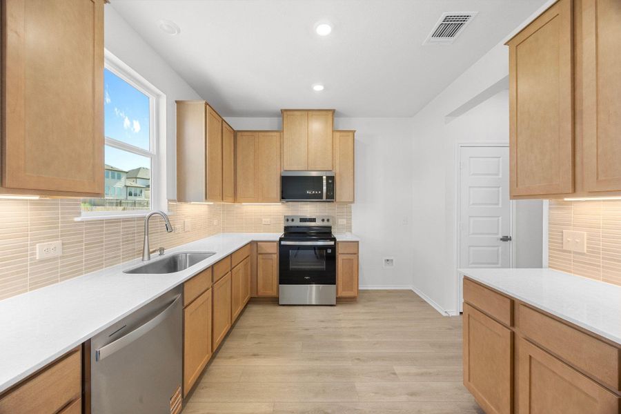 Furnished interior view inside a new home in Retreat at San Gabriel, Georgetown (Image 12).