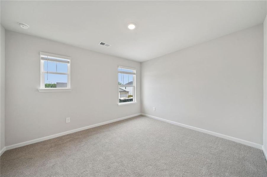 Spacious, unfurnished interior of a new home in Vines at Mill Creek - Estate Series, Braselton (Image 23).