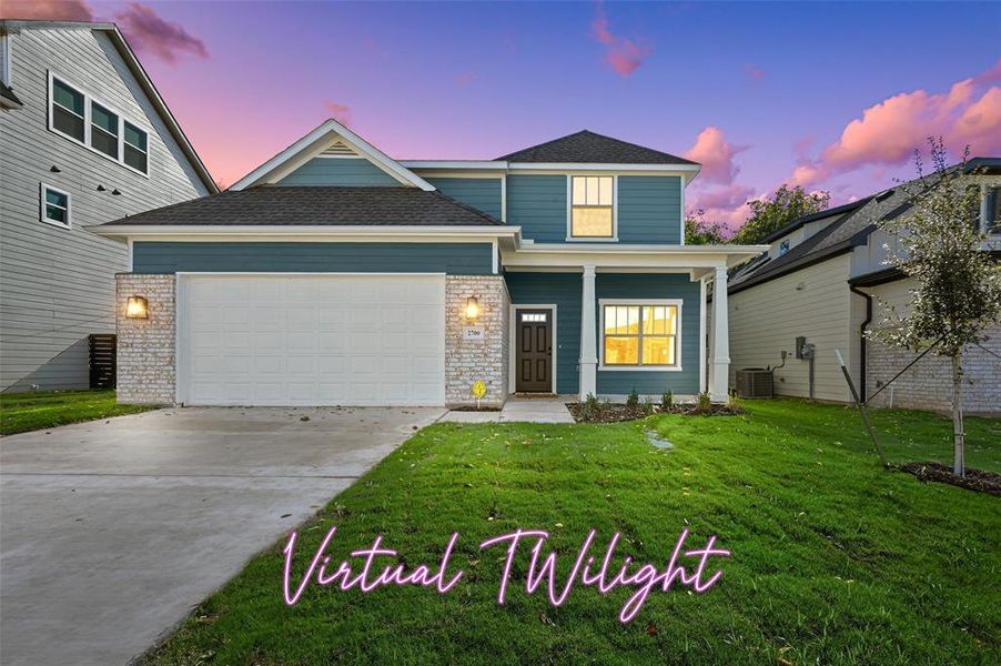 View of front of property with a yard, central AC, and a garage