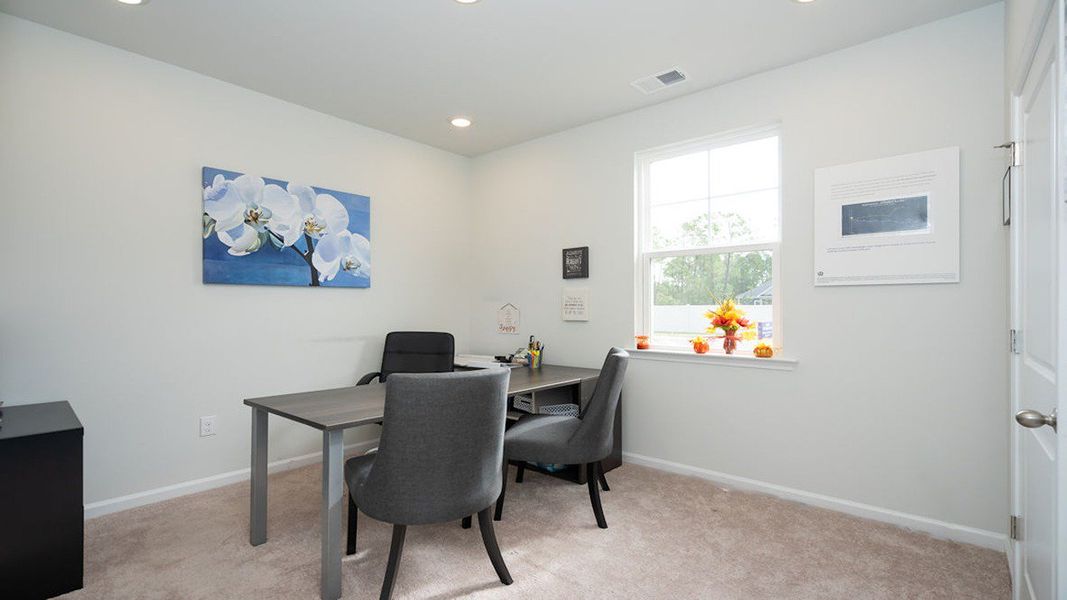Representative furnished interior of a home built from the KERRY by D.R. Horton in Longleaf Village, Rincon (Image 8).