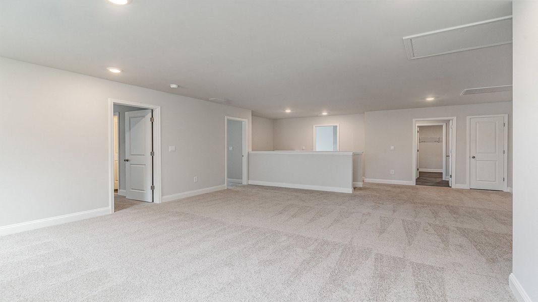Representative unfurnished interior of a home built from the Westerly by D.R. Horton in Lake Tide Summit, Chapin (Image 26).