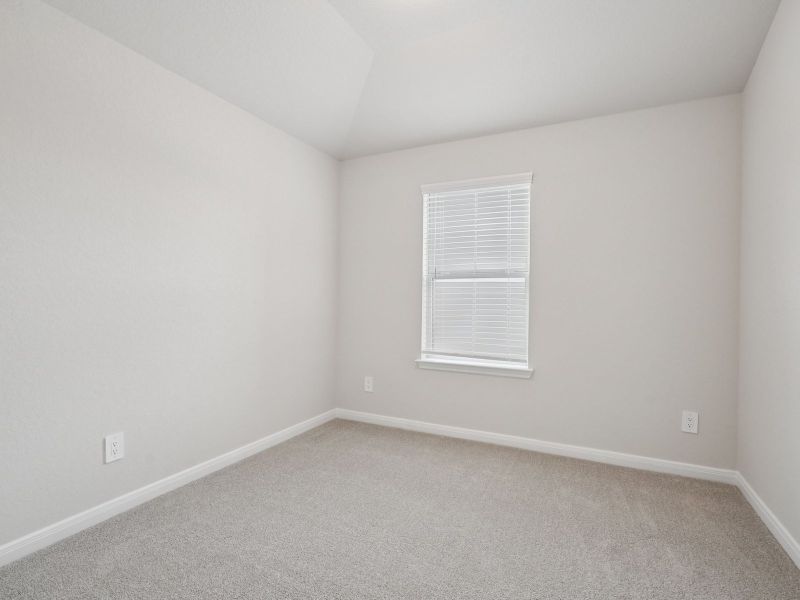 Guest bedroom in the Briscoe floorplan at a Meritage Homes community. Guest bedroom in the Briscoe floorplan at a Meritage Homes community.