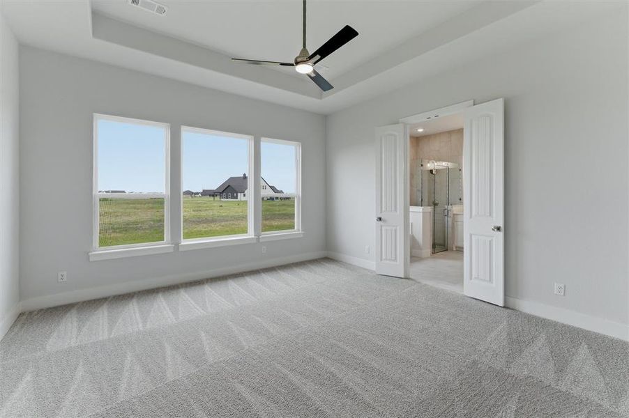 Neutral-toned carpeting throughout