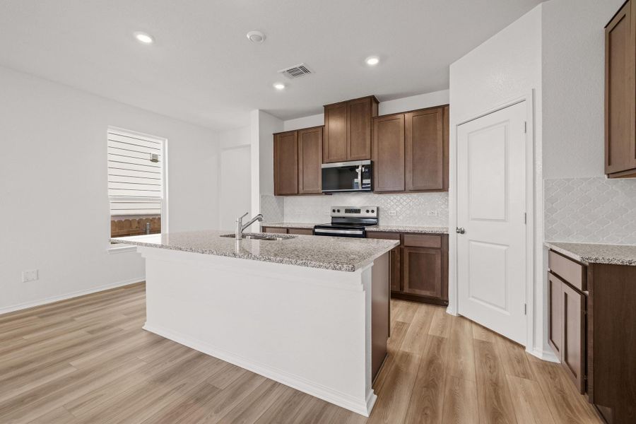 Furnished interior view inside a new home in Sonterra - Cool Water, Jarrell (Image 9).
