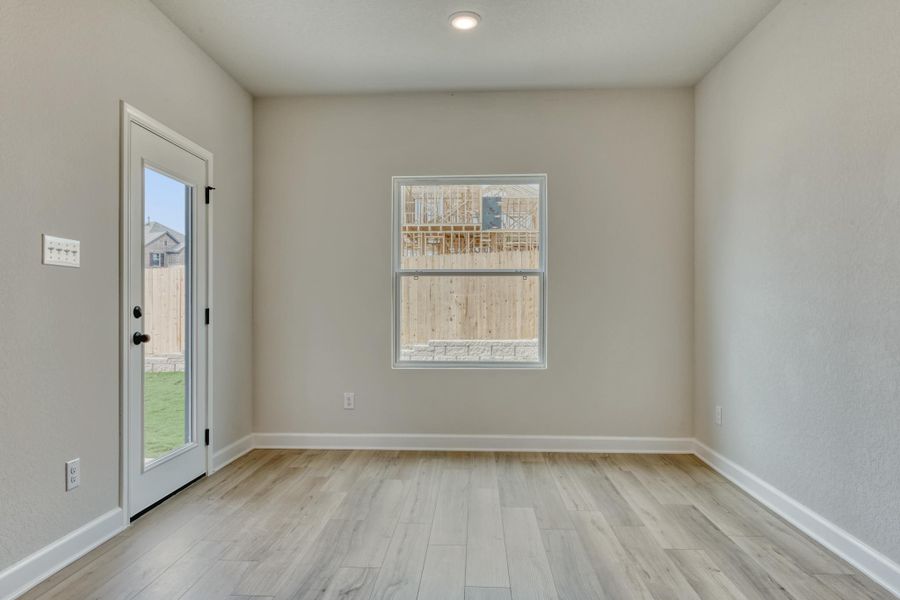 Representative unfurnished interior of a home built from the Kennedy by Ashton Woods in Hennersby Hollow, San Antonio (Image 21).