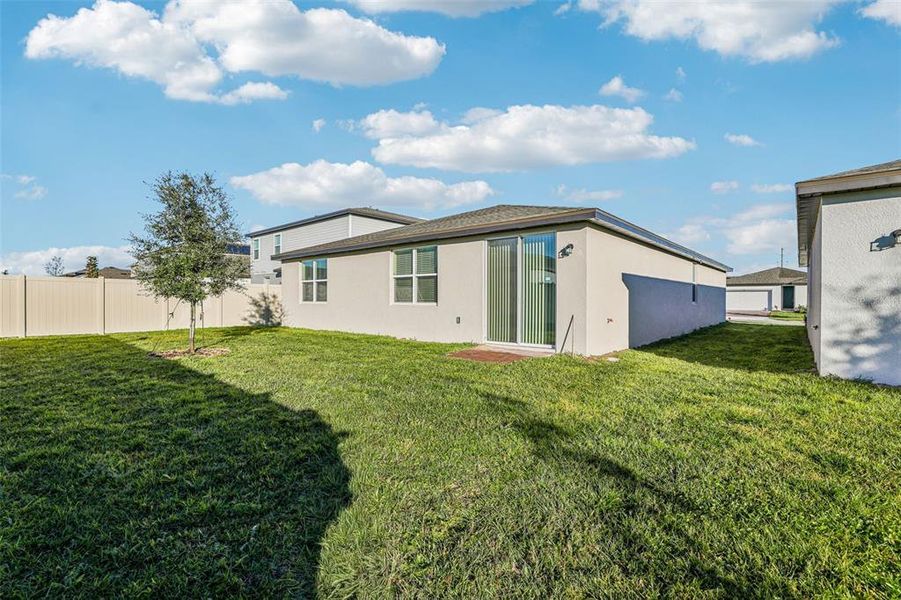 Exterior details and patio area of a home in Lawson Dunes - Signature Series, Haines City (Image 3). Exterior details and patio area of a home in Lawson Dunes - Signature Series, Haines City (Image 3).