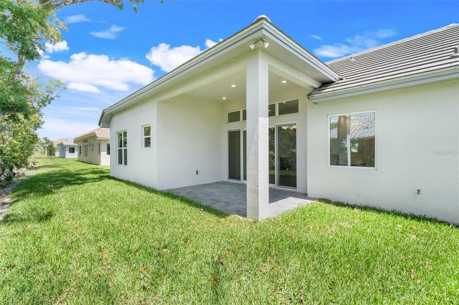 Exterior details and patio area of a home in Toscana, Palm Coast (Image 31). Exterior details and patio area of a home in Toscana, Palm Coast (Image 31).