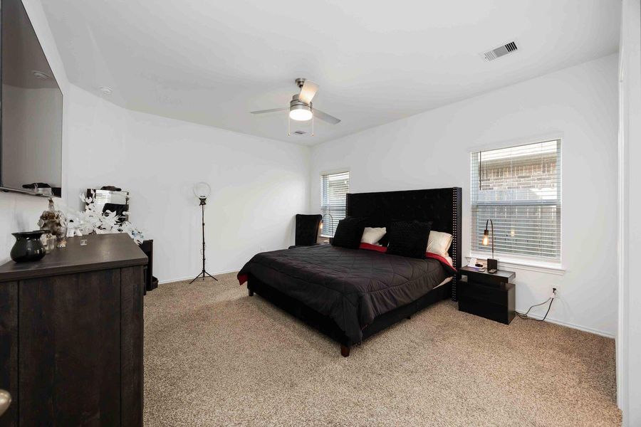 Primary retreat on the first floor with abundant space and natural light Primary retreat on the first floor with abundant space and natural light