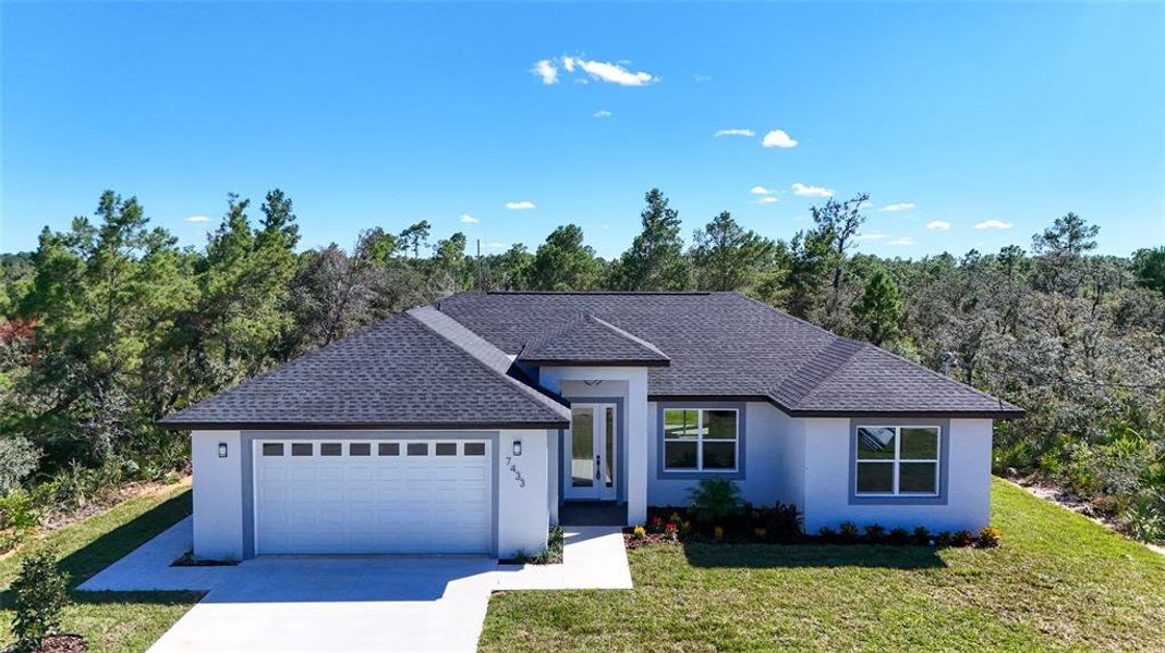 Front exterior of a new home in , Sebring, FL, highlighting curb appeal (Image 2). Front exterior of a new home in , Sebring, FL, highlighting curb appeal (Image 2).