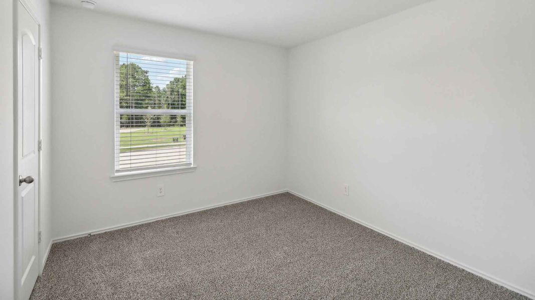Spacious, unfurnished interior of a new home in Grand Pines, Magnolia (Image 24).